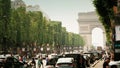 PARIS, FRANCE - JUNE 12, 2023. Road traffic on Avenue des Champs-Elysees and distant Arc de Triomphe or Triumphal Arch Royalty Free Stock Photo
