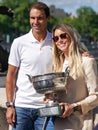 Roland Garros 2022 Champion Rafael Nadal of Spain and his sister Maria Isabel Nadal posing with championship trophy in Paris