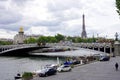 PARIS, FRANCE - JUNE 6, 2022: Seine River with Pont Alexandre III Bridge and Eiffel Tower in Paris, France Royalty Free Stock Photo