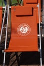 Spectator lounge chair with Roland Garros logo at Le Stade Roland Garros in Paris, France