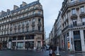 Paris, France - June 01, 2018. Paris street view with traditional french building facades under summer evening sun rays. Parisian