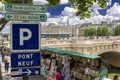 Paris, France - 14 June, 2013: Traditional Bouquiniste booth on the edge of the Seine. The Bouquinistes sell used and antique book