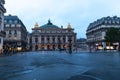 Paris, France 01 June 2018 Traffic cars in front of Opera, Paris. The Palais Garnier is a 1,979-seat opera house, which was built Royalty Free Stock Photo