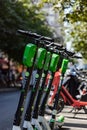 Paris, FRANCE - June 27, 2019: View of Lime electric scooters, rented through a mobile app and dropped off anywhere in the French