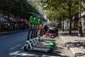 Paris, FRANCE - June 27, 2019: View of Lime electric scooters, rented through a mobile app and dropped off anywhere in the French