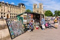 Vintage books and paintings on embankment of River Seine near No Royalty Free Stock Photo