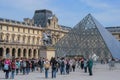 The Louvre Palace and the pyramid. Sightseeing tour around Paris. Royalty Free Stock Photo