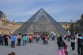 The Louvre Palace and the pyramid. Sightseeing tour around Paris. Royalty Free Stock Photo