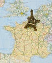 Paris on France map with miniature Eiffel tower Royalty Free Stock Photo