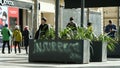 Insurrection graffiti sign on urban Furniture Yellow Vests Paris