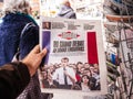 Grand Debat Emmanuel Macron on Liberation Newspaper POV man shopping press