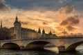 Beautiful sunset on the banks of the Seine with conciergerie monument in background in Paris Royalty Free Stock Photo