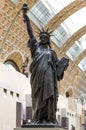 Paris, France, March 28 2017: A bronze replica of the Statue of Liberty by French sculptor Bartholdi stands in the Orsay