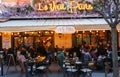 The famous Cafe Le Vrai Paris at night . It is located in the Montmartre, Paris, France.