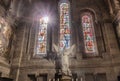 Paris, France - March 14, 2018: Chapel with angel and Stained glass window inside The Basilica of the Sacred Heart of Paris, is a Royalty Free Stock Photo