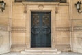 Paris, France, March 28 2017: Door architectural exteriors details of the Louvre museum Royalty Free Stock Photo