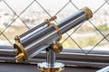 Paris, France, March 30, 2017: Eiffel Tower telescope overlooking for Paris. Old panoramic viewer or telescope on the Royalty Free Stock Photo
