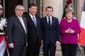 PARIS, FRANCE - MARCH 25, 2018 : Emmanuel Macron, Angela Merkel and Jean-Claude Juncker and Xi Jinping at the Elysee Palace