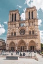 Paris, France, March 27, 2017: The facade of catholic cathedral Notre-Dame de Paris. Built in French Gothic architecture Royalty Free Stock Photo