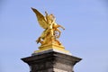 Golden Statue on the end of Pont Alexander III. Paris, France. March 29, 2023.