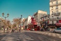 Paris, France, March 31 2017: Moulin Rouge is a famous cabaret built in 1889, locating in the Paris red-light district Royalty Free Stock Photo