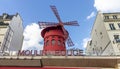 Paris, France - March 16, 2018: Moulin Rouge - famous cabaret built in 1889, in red-light district Pigalle on Boulevard de Clichy Royalty Free Stock Photo