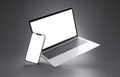 PARIS - France - March 15, 2023: Newly released Apple Macbook Air and Iphone 14, Silver color. Side view. 3d rendering laptop