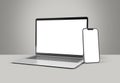 PARIS - France - March 15, 2023: Newly released Apple Macbook Air and Iphone 14, Silver color. Side view. 3d rendering laptop