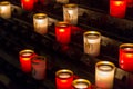 Paris, France, March 27 2017: Rows of firing lit votive candles inside Notre Dame de Paris, France Royalty Free Stock Photo