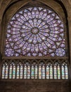 Paris, France - March 13, 2018: Stained glass window in Notre dame cathedral. North Rose window at Notre Dame cathedral dates