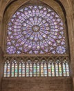 Paris, France - March 13, 2018: Stained glass window in Notre dame cathedral. North Rose window at Notre Dame cathedral dates