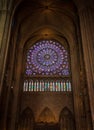 Paris, France, March 27, 2017: Stained glass window at Notre Dame cathedral. Notre Dame church is one of the top tourist Royalty Free Stock Photo