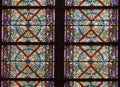 Paris, France, March 27, 2017: Stained glass window at Notre Dame cathedral. Notre Dame church is one of the top tourist Royalty Free Stock Photo