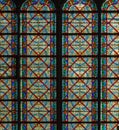 Paris, France, March 27, 2017: Stained glass window at Notre Dame cathedral. Notre Dame church is one of the top tourist Royalty Free Stock Photo