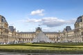 Paris, France - March 17, 2018: View of famous pyramid of Louvre museum and Louvre Palace Royalty Free Stock Photo