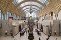 Paris, France, March 28 2017: Visitors in the Musee d`Orsay in Paris, France. The museum houses the largest collection