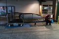 Paris, France - may 27, 2018: Anti soccial homeless sitting on the bench in railway station Montparnass