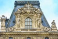 Paris, France - May 1, 2017: a beautiful architecture on the roof of the Cour Napoleon at the Louvre Museum on May 1, 2017, in Pa