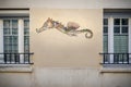 Detail of a seahorse painted on an apartment building, Butte-aux Royalty Free Stock Photo