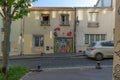 Various graffitis painted on a small building, Butte-aux-Cailles Royalty Free Stock Photo