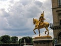 Golden equestrian statue of Jeanne d`Arc