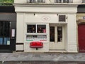 PARIS, FRANCE - MAY 24, 2022: Italian pizzeria facade with car hood in Paris