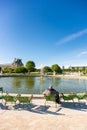 Paris.  Lonely Man Sits and Relaxing on a Chair in Tuileries Garden Royalty Free Stock Photo