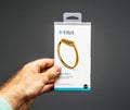 Man holding package with fitbit tracker Royalty Free Stock Photo