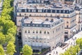 Paris. Old Building on Avenue des Champs Elysees next to Arc de Triomphe. View from Arc de Triomphe in Royalty Free Stock Photo