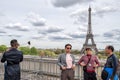 PARIS, FRANCE - MAY 2, 2016: Tourist taking pictures at Tour Eiffel town symbol Royalty Free Stock Photo