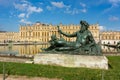 Paris, France - May 2019: Versailles palace and gardens with Neptune statue Royalty Free Stock Photo