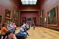 Paris, France - May 13, 2015: Visitors visit Rubens paintings in Louvre Museum