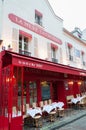 Paris, France, 11.22.2018 Montmartre, La Mere Catherine cafe bistro in red colors with tables for guests