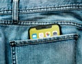 New Apple iPhone X 10 in pocket of denim jeans trousers Royalty Free Stock Photo